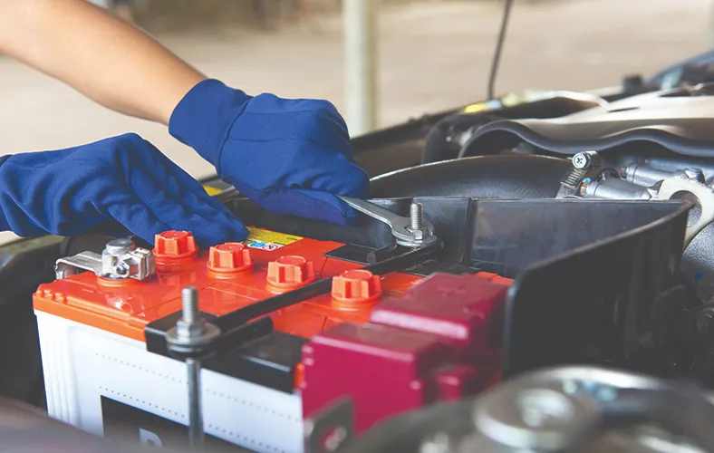 Forklift battery being serviced and tested